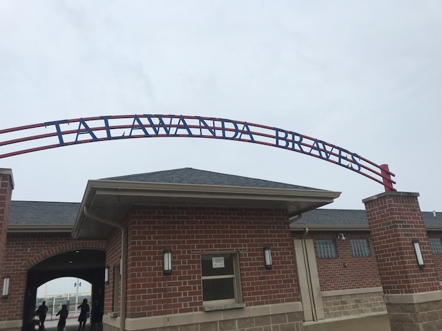 An archway at the high school stadium reads, “Talawanda Braves.” <em>Photo by Halie Barger</em>