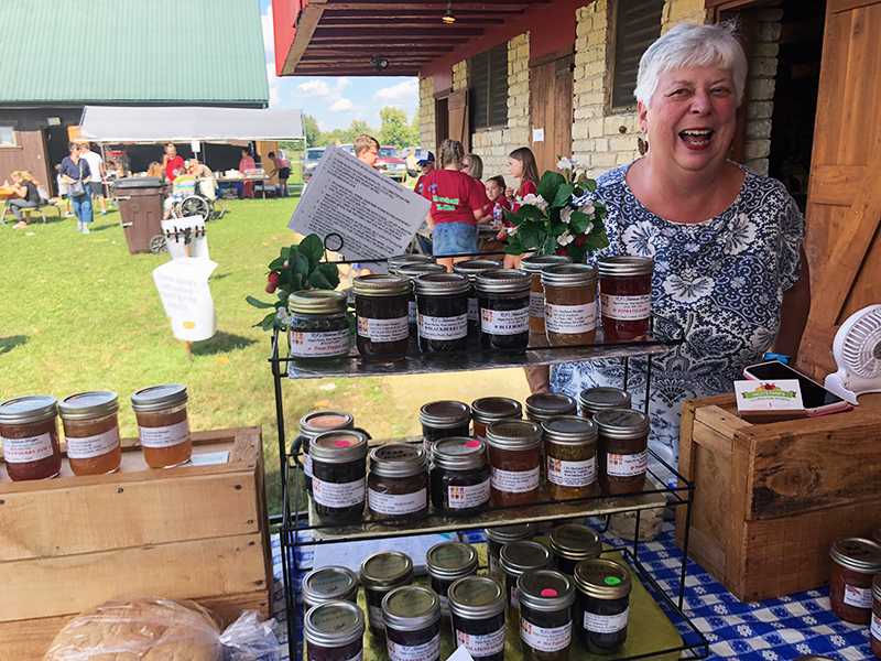 Carol Hiatt sells her homemade jams at the 2018 Apple Butter Festival. <em>Photo by Tori Levy</em>