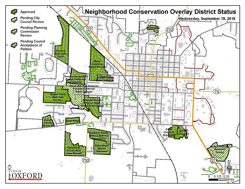 The areas shaded in green represent the existing overlay districts in Oxford. The green striped area along Route 27 in the lower right corner of the map is the Juniper Hill subdivision, now being considered for an overlay designation.
