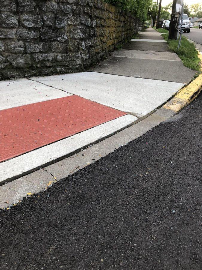 Oxford+spent+almost+%5C%2490%2C000+last+month+on+embedding+rubberized+mats+like+these+into+sidewalks+so+that+those+with+impaired+vision+can+sense+that+they+are+nearing+an+intersection.+Curb+cuts%2C+such+as+the+one+shown%2C+also+make+it+possible+for+those+in+wheelchairs+to+navigate+intersections.+Photo+by+Patrick+Donovan