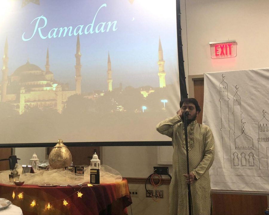 Tanbir Ahammad calls for the Maghrib prayer at sunset (athan), right before everyone practicing Ramadan broke their fast for the first time all day. Photo by Leanne Stahulak.