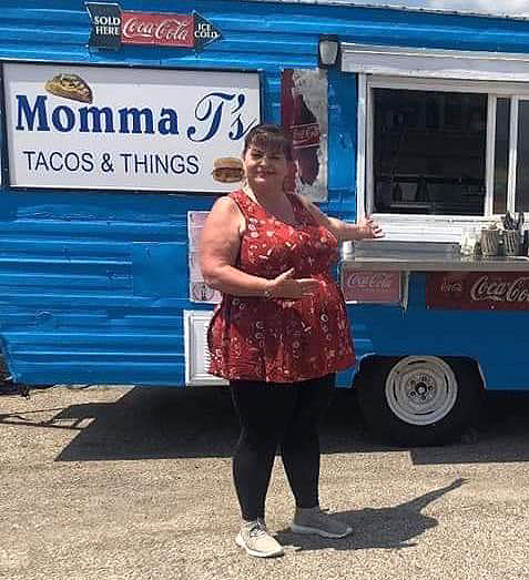 Theresa Martinez in front of her Momma T’s Tacos and Things, where she serves 400 tacos a day from her mobile food wagon. Photo courtesy of Theresa Martinez