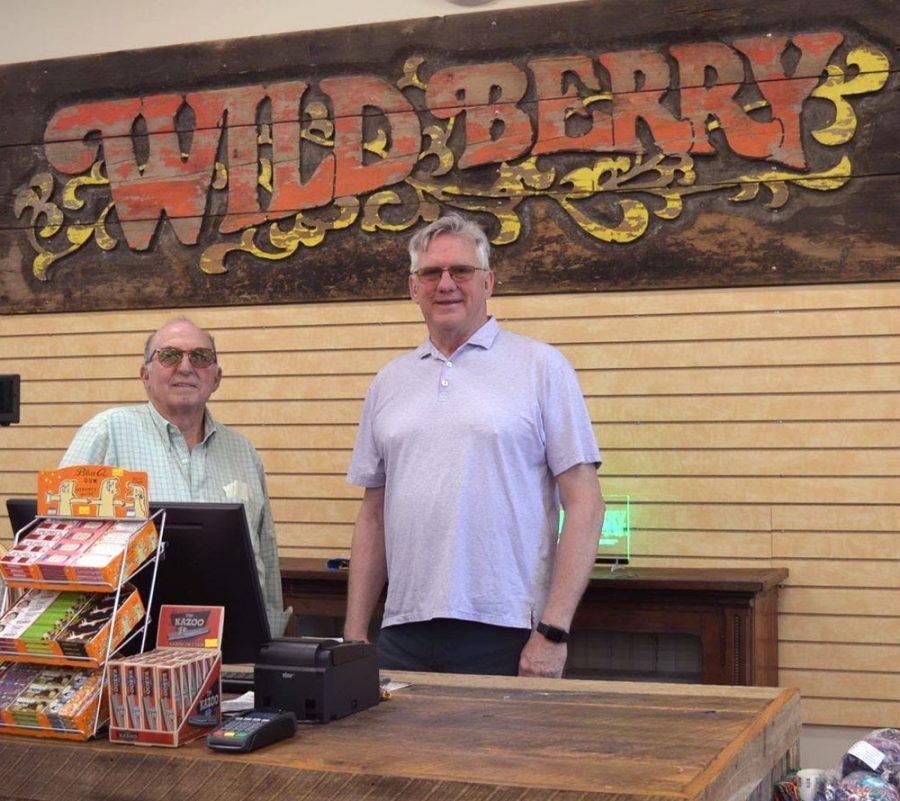 Wild Berry business owners Marc Biales (left) and Roger Atkin stand behind the counter in their new factory incense store. Photo provided by Wild Berry