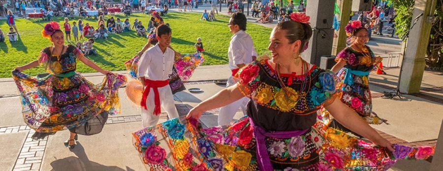 Cultural dancing and costumes such as these from  a previous year’s festival will be part of the fun again at this year’s UniDiversity festival Uptown on Friday, Sept. 20. Photo courtesy of Enjoy Oxford.