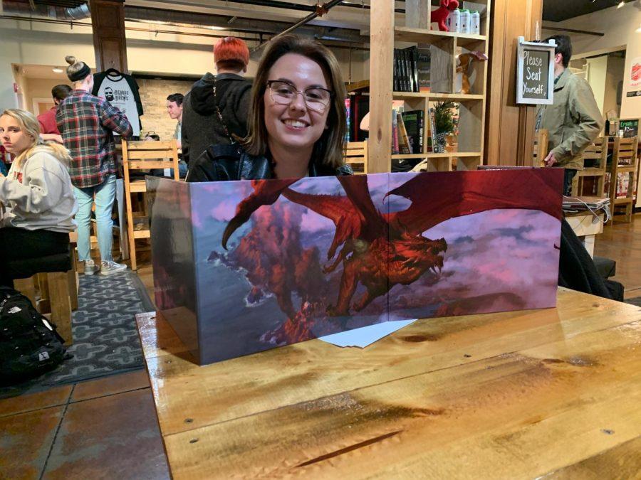 Rachel Brandenburg sets up to be a dungeon master in a game at Books & Brews on Tuesday. <em>Photo by Abby Jeffrey.</em><br>