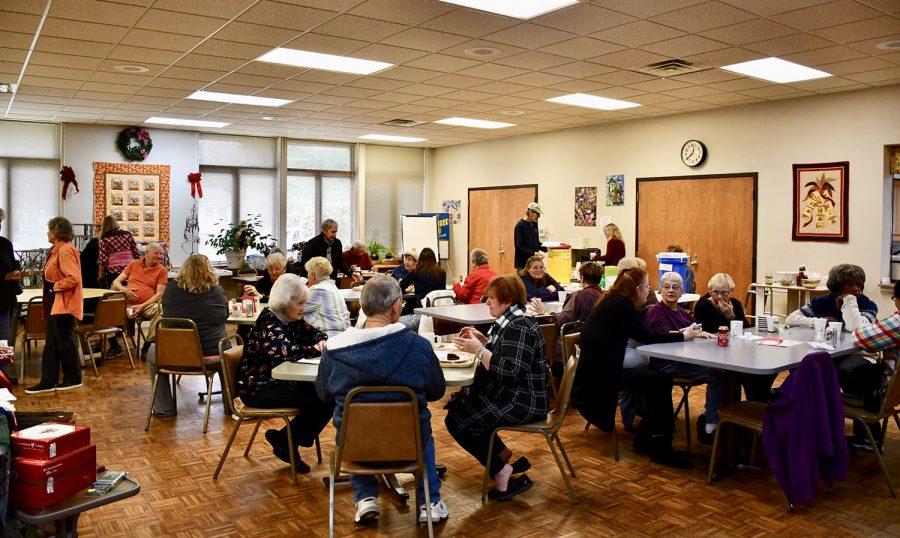 The camaraderie of a homemade bean soup and cornbread luncheon is always a popular part of the annual Oxford Seniors’ Holiday Market. Photo by Lauren Shassere