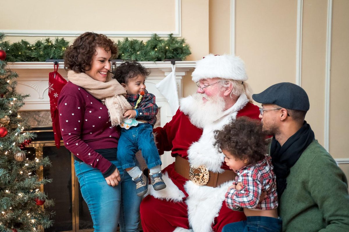 Santa Claus was available for pictures and wish lists last year. He will be back this year, at the Oxford Community Arts Center from noon to 2 p.m.; when he arrives at the park pavilion on a fire truck at 6:30 p.m.; and for more photos and lap sitting from 6:30 p.m. to 8 p.m., on his throne in the Enjoy Oxford office, 14 W. Park Place, suite C. Photo provided by Enjoy Oxford. 