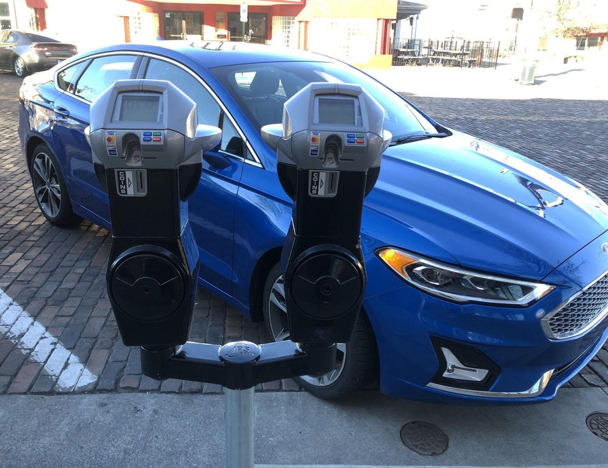 A pair of “smart” meters, that take credit cards as well as coins, installed on High Street. Photo by Halie Barger