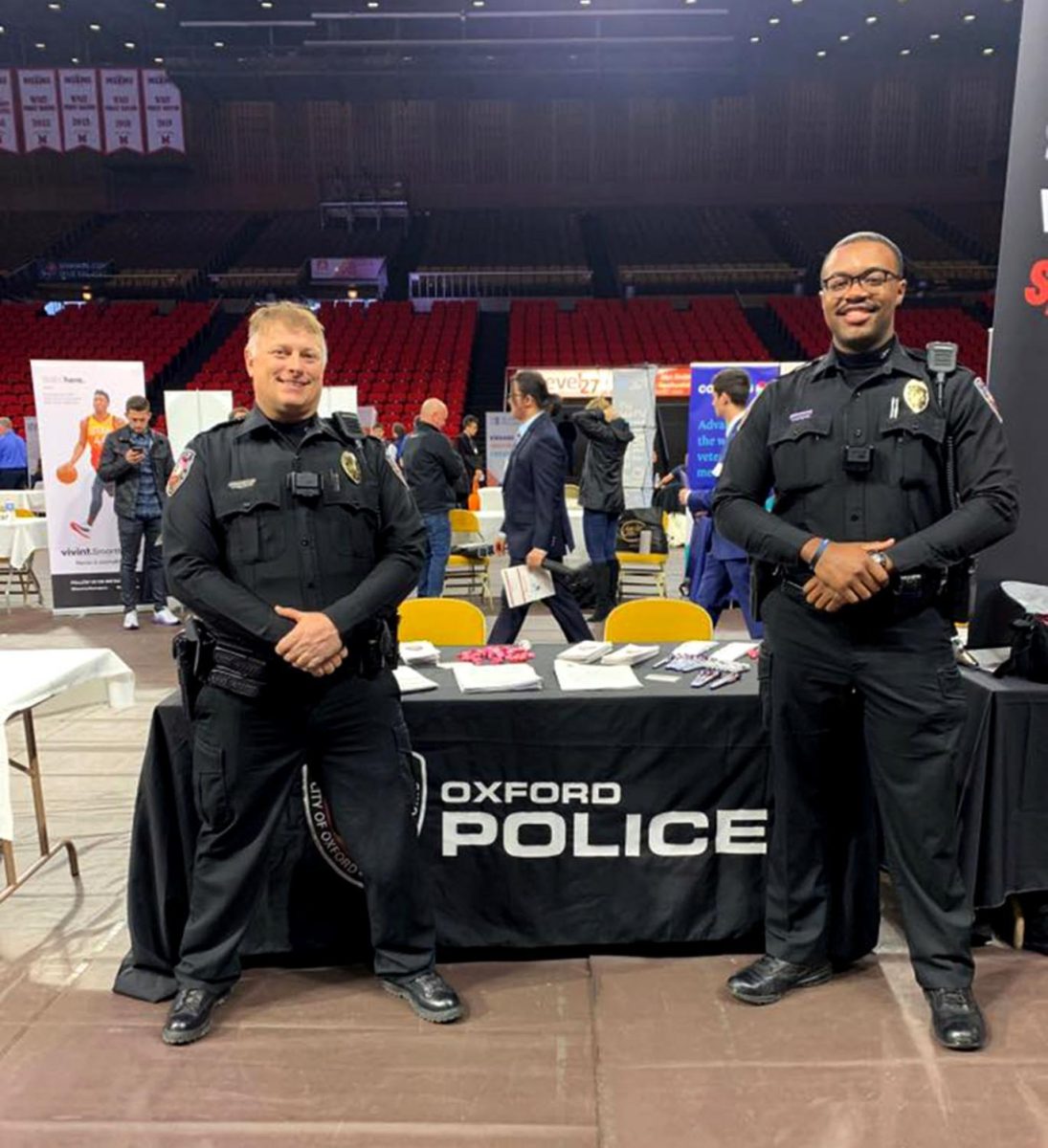Officers Pete Durkin and Anthony Jones worked the Oxford Police Department table at Miami’s Spring Career and Internship Fair on Wednesday in Millett Hall. The police department was one of a handful of local employers among the 250 at the fair. OPD has two open positions for police officers at the moment according to its Facebook page. Photo by the Oxford Police Department. 