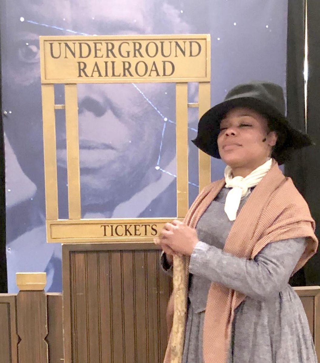 Brandi Sherrill, portraying Harriet Tubman in a one-woman show at the Oxford Community Art Center on Monday, interacting with the audience of children. Photo provided by Joseph Burtzlaff