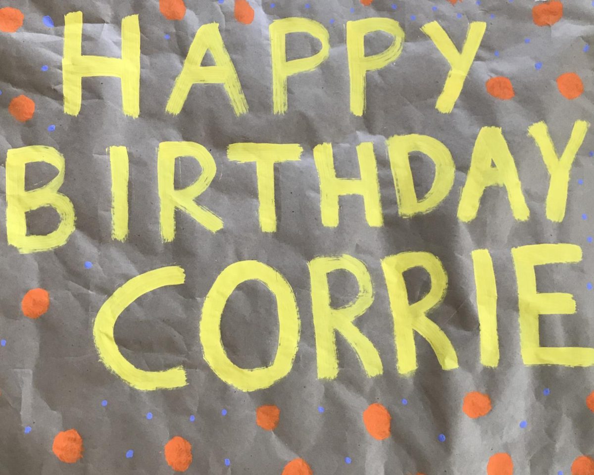 Neighbors surprised Corrie Branche on her birthday with banners and a parade outside of her house. Photo by Logan Branche