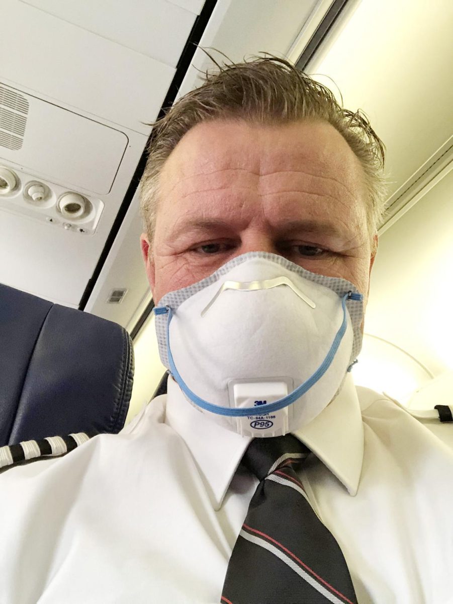 Capt.+Michael+Bonner+of+Southwest+Airlines%2C+wearing+a+mask+on+his+commuter+flight+to+Chicago%2C+where+he+will+take+over+as+pilot+on+an+aircraft.+Photo+provided+by+Michael+Bonner+