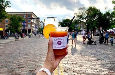 Adults are permitted to buy drinks in specially marked cups and stroll along a few blocks of High Street during the Friday events. 