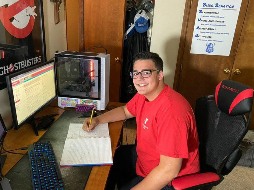 Miami freshman Maxwell Kemper at his family’s home in Miamisburg, where he has been attending class virtually, since the start of the semester on Aug. 15. He plans to move into a campus dormitory this coming week, and begin taking classes in person Sept. 21
