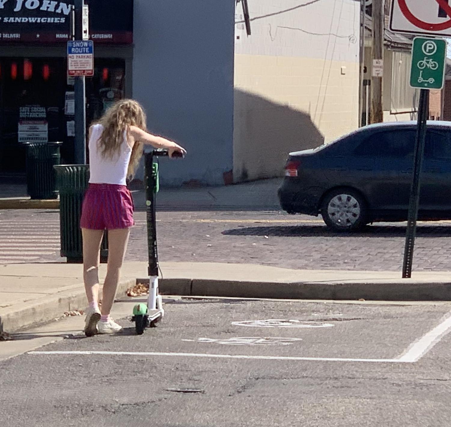 Students rent scooters from designated parking areas