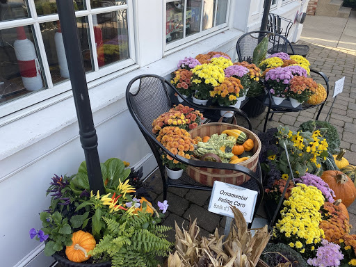 Goods from Shademakers garden center displayed outside of Books & Brews