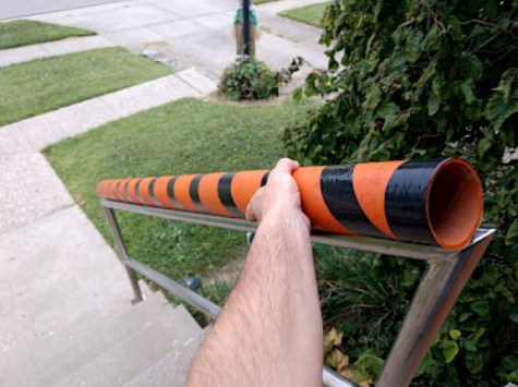  A makeshift candy chute like this one allows residents to slide candy down the porch railing to children while maintaining social distancing. 