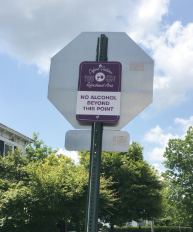 Sign making a boundary of the DORA, Designated Outdoor Refreshment Area, Uptown.