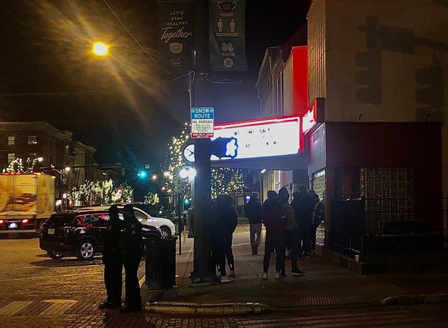 People+began+to+line+up+outside+of+the+Brick+Street+Bar+%26+Grille%2C+36+E.+High+Street%2C+at+about+8+p.m.+Thursday%2C+waiting+for+a+chance+to+go+inside.+The+statewide+curfew+was+pushed+back+from+10+p.m.+to+11+p.m.+Thursday+night.+