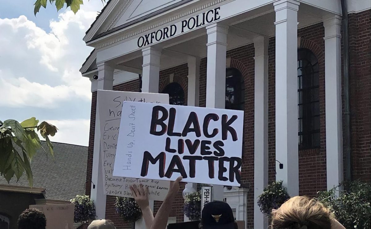 Protesters gather outside the Oxford Police Department during last September’s Black Lives Matter demonstration.