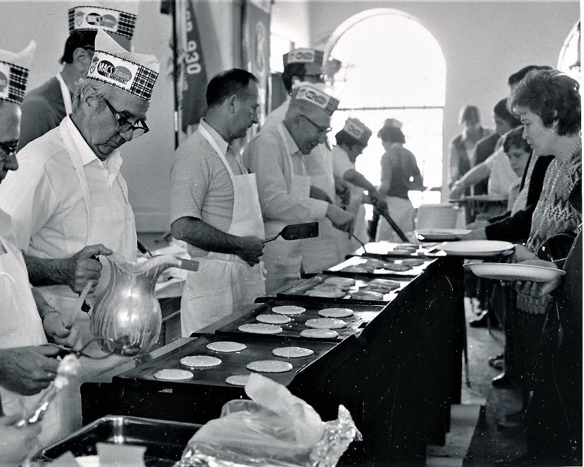 A Kiwanis Pancake Day is celebrated in the Oxford Municipal Building during the 1970s. 