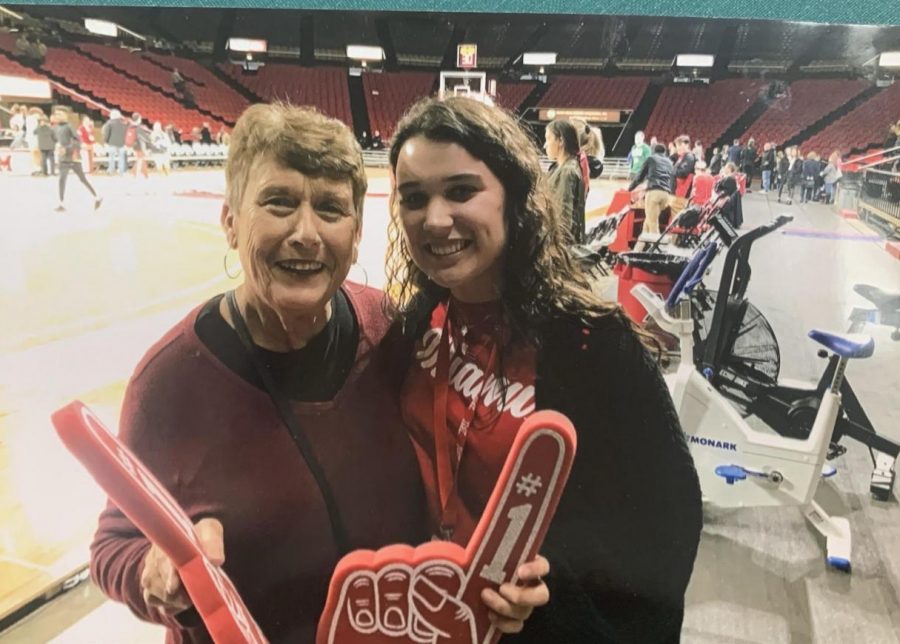 Marilyn Elzey with granddaughter Emma Lange with their Miami gear at Millett Hall.