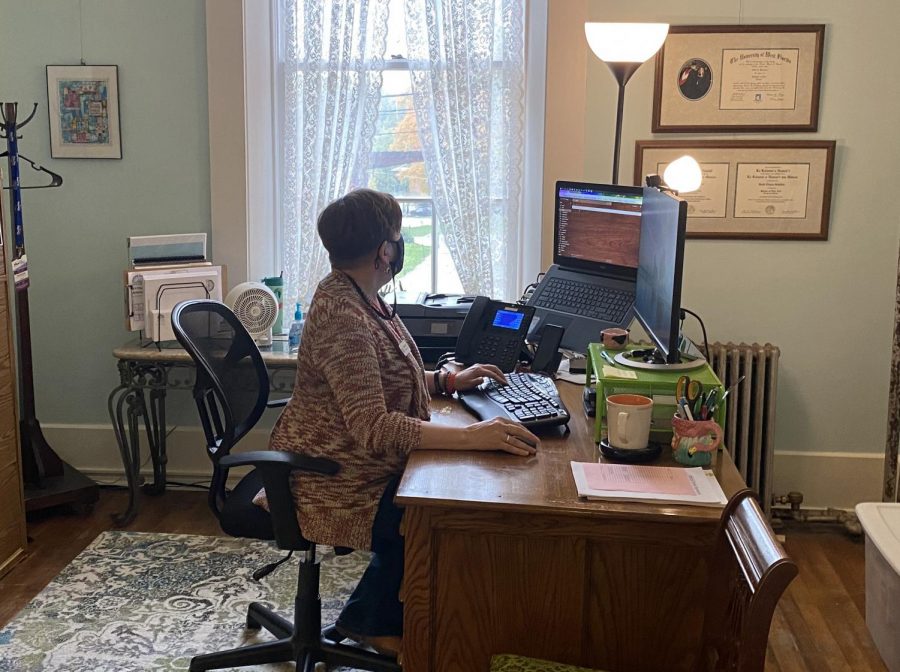 Executive Director Heidi Schiller in her office planning the Oxford Community Arts Center’s anniversary celebration.