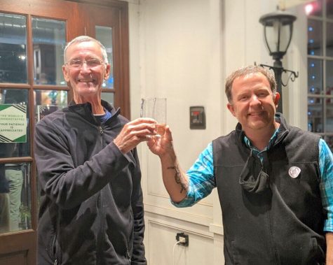 Incumbent Patrick Meade (left) and newcomer David Bothast easily won election to the two open seats on the Talawanda Board of Education, against three other challengers. They toasted their victory on Election night at Church Street Social in Oxford, where they watched the returns come in.