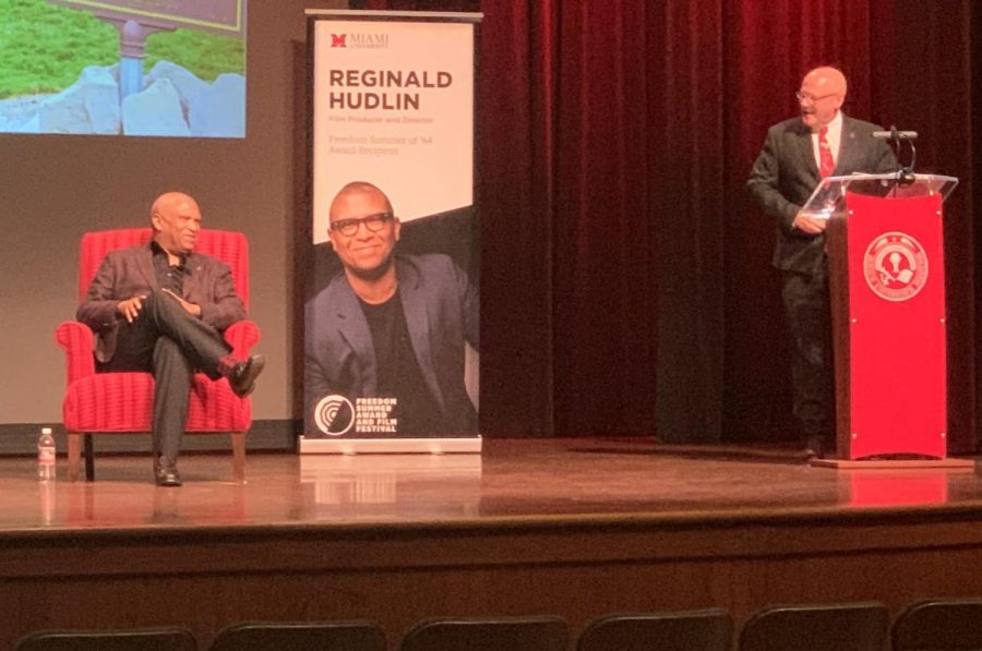 Miami President Gregory Crawford presents the Freedom Summer ’64 Award to movie producer and director Reginald Hudlin (left), Sunday, Nov. 7, in Hall Auditorium. 