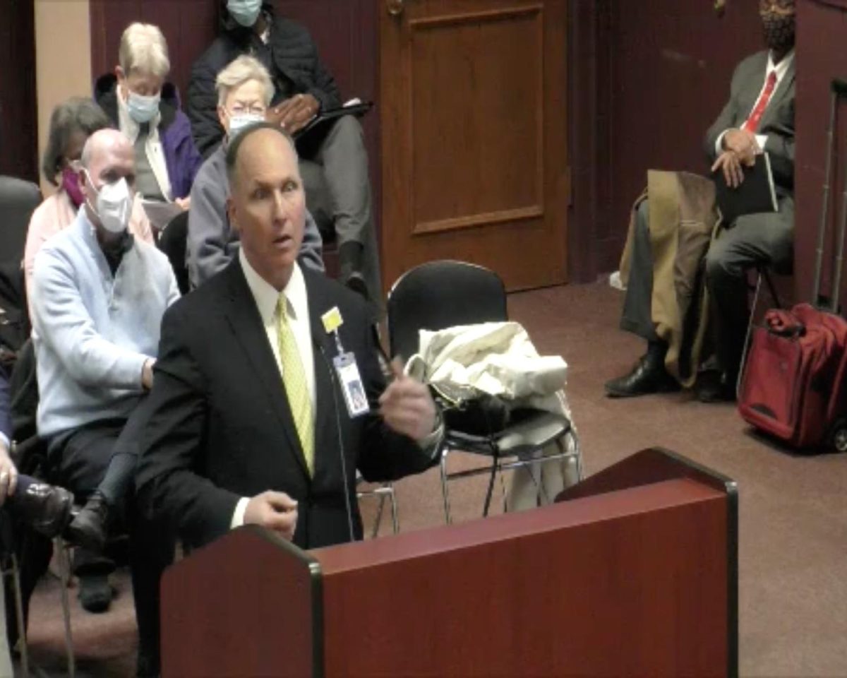Michael Everett, president and COO of McCullough-Hyde Memorial Hospital, gives a briefing on local COVID numbers at Tuesday’s city council meeting. 
