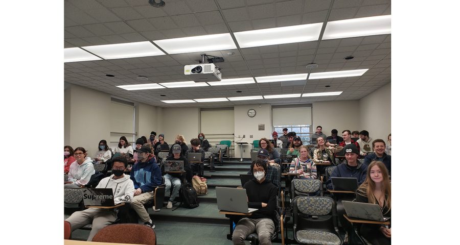 Miami's lecture halls are filled with a mix of student preferences towards masks, with many students opting out of wearing masks as the option becomes available, as seen here in a Thursday class in Upham Hall. 