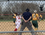 Talawanda senior Maddie Patton (14) drives a single to left center field against Little Miami. 