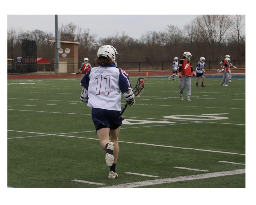 Talawanda Senior Nick Engelhard takes to the field during a lacrosse game last year