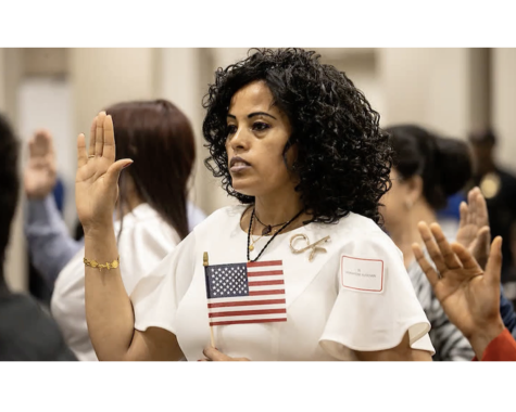 New citizens take oath at naturalization ceremony