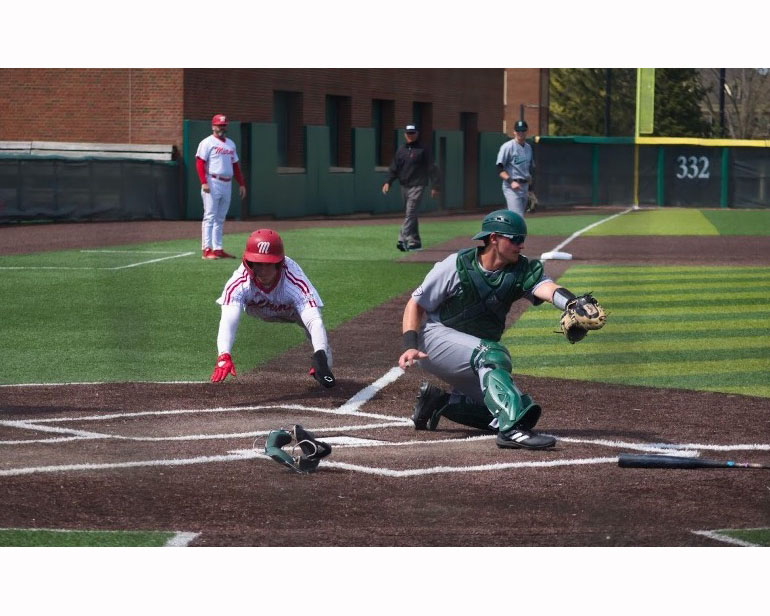 Miami tries to slide home in the 3rd inning vs Ohio
