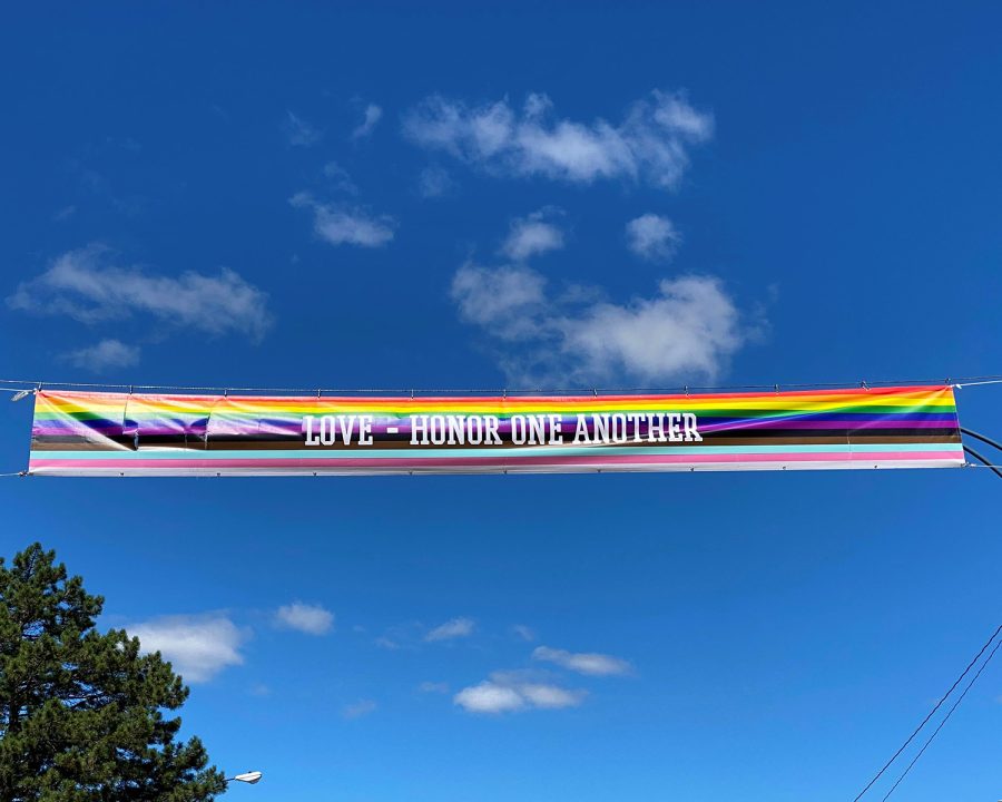 PFLAGs Pride Month banner hangs over High Street.