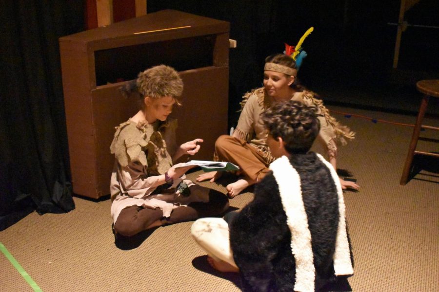 Lost Boys Twin One (Allison Simmons) and Curly (Luke Bowman) rehearse lines before the show with a member of the Piccaninny Tribe, Haley Uhl.
