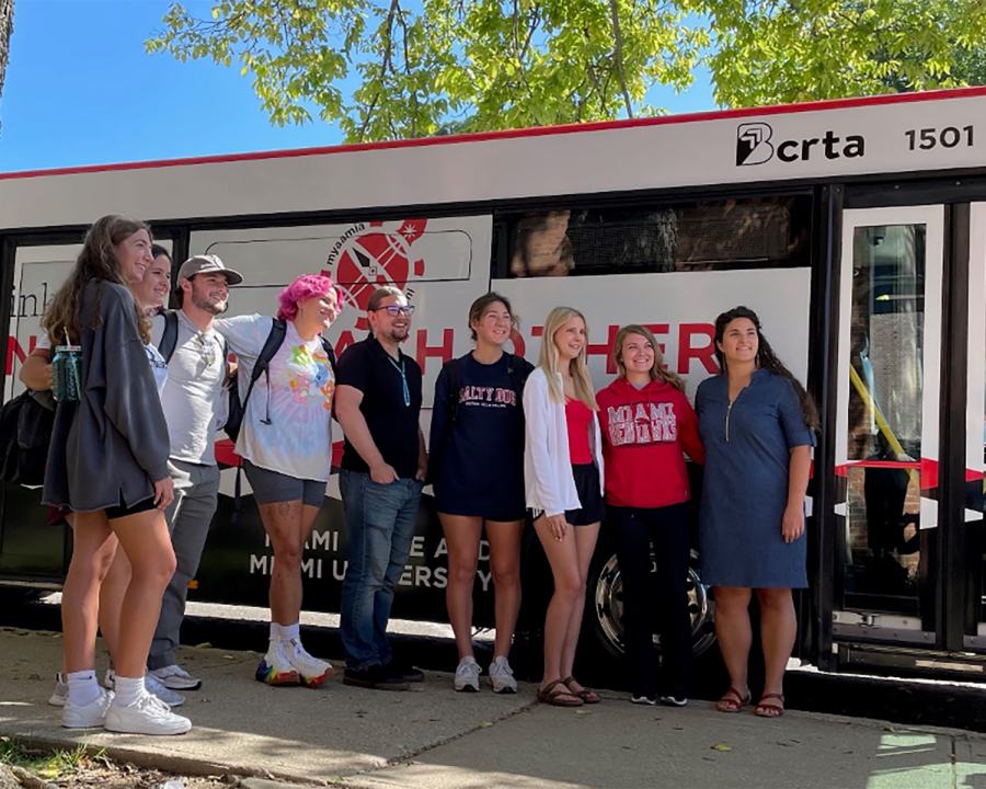 Students from in the Myaamia Heritage program pose with the BCRTA bus. 
