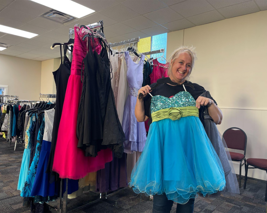 Princess Project founder Melanie Moore models one of the gowns that were on display at the event at Oxford Presbyterian Church.