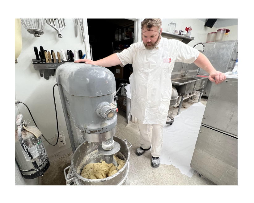 Joshua Francis uses a Hobart mixer to make the doughnut dough. The mixer is actually an original appliance of the Shoppe that was handed down from each owner.