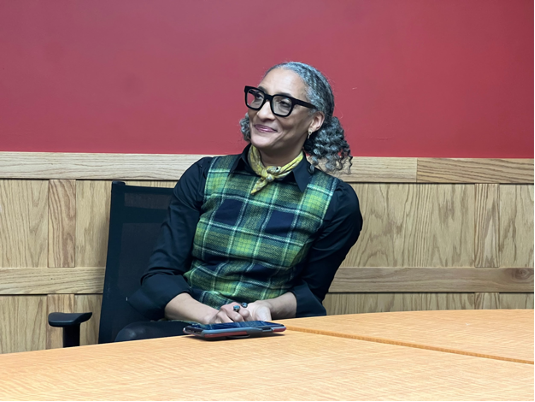 Carla Hall talks to reporters in Williams Hall.