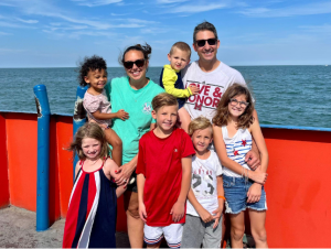 Alison and Joe Kleibscheidel with children Grace, Joey, Rocky, Shep and Mary. The familys children might be in separate school building if a proposed plan goes forward.