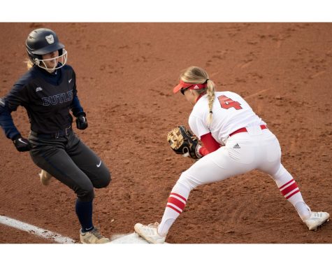 RedHawk infielder Chloe Parks tags a runner in a game against the  Butler Bulldogs 
