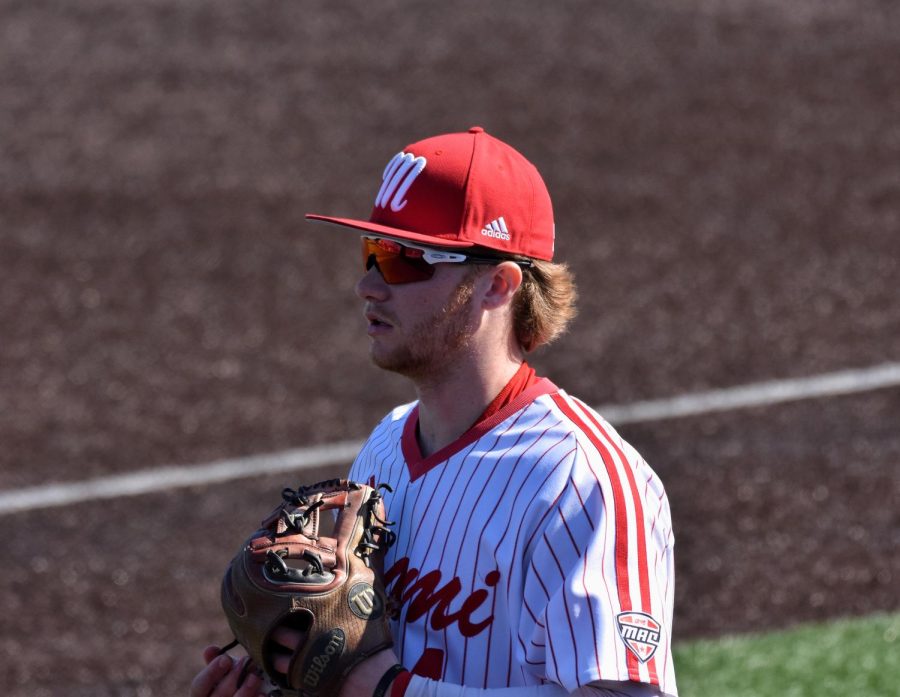 Infielder Blake Buzzeo walks out for fielding work.


