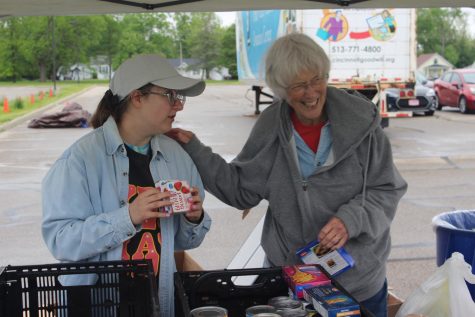 Olivia Herron and Alice Laatsch share a laugh while sorting through donated food at Chestnut Fields during last years ShareFest.
Photo by Kaylee Olmsted
