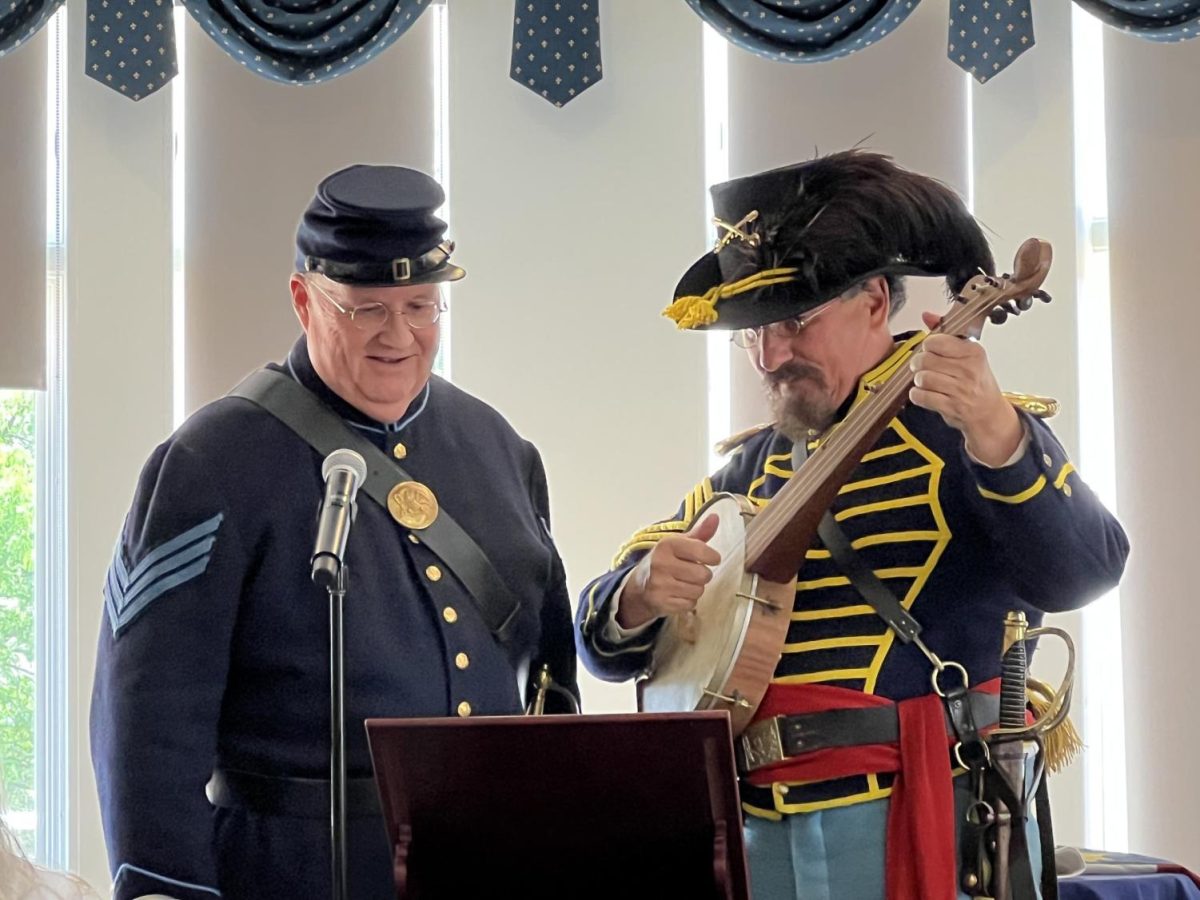 Civil War reenactors Paul Walsh and Bill Gay perform at the annual Butler County DAR Flag Day luncheon at the Knolls of Oxford. 