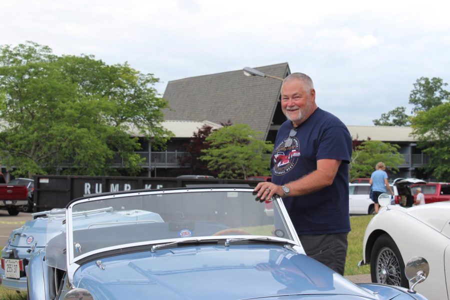 Brarry Cox poses with the 1960 TR3A Triumph that he’s had since 2010.