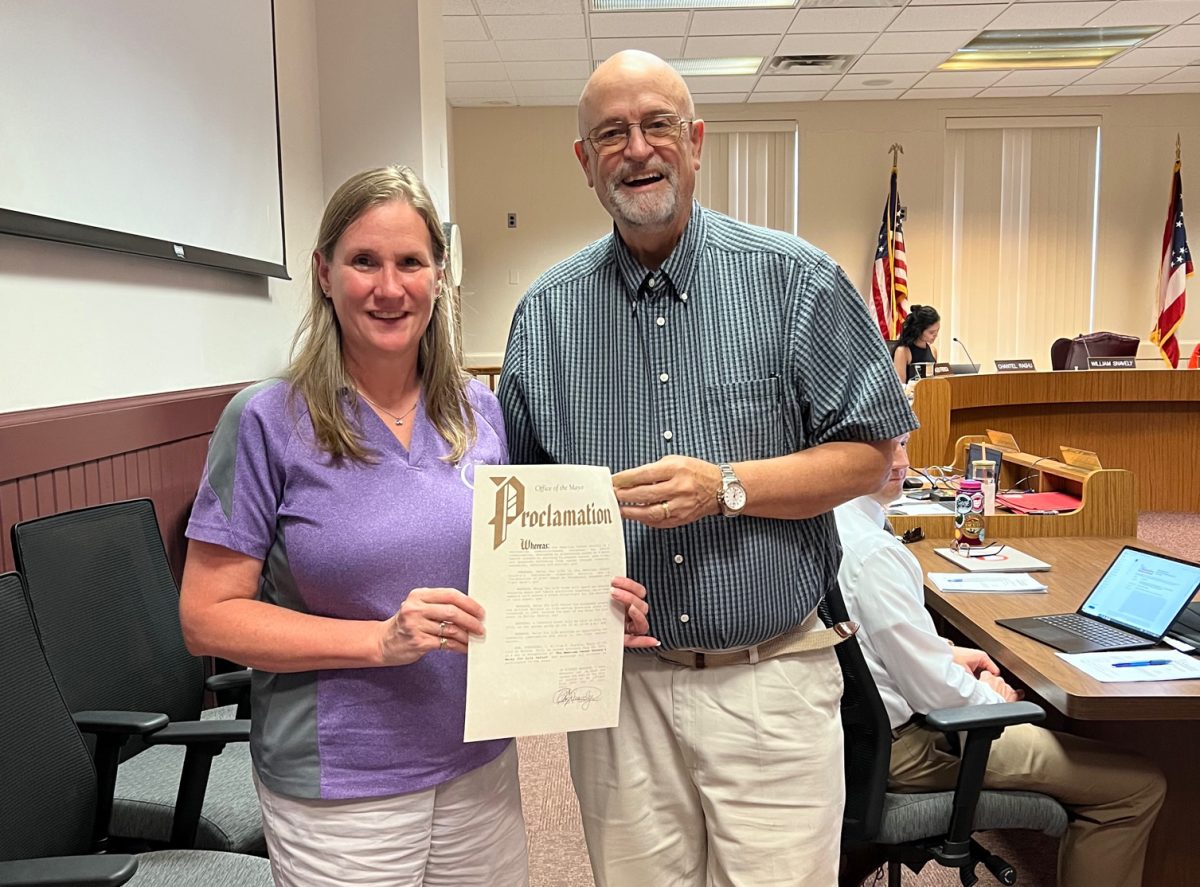 Mayor William Snavely presenting a proclamation declaring July 20 as “The American Cancer Society’s Relay for Life Oxford” to Jennifer Lake who began participating in Relay for Life in 1999.


