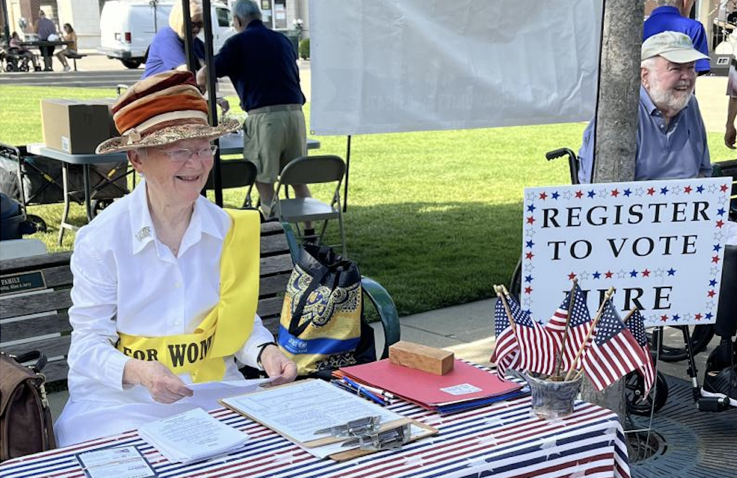 Prue Dana of the League of Women Voters at a recent parade. 