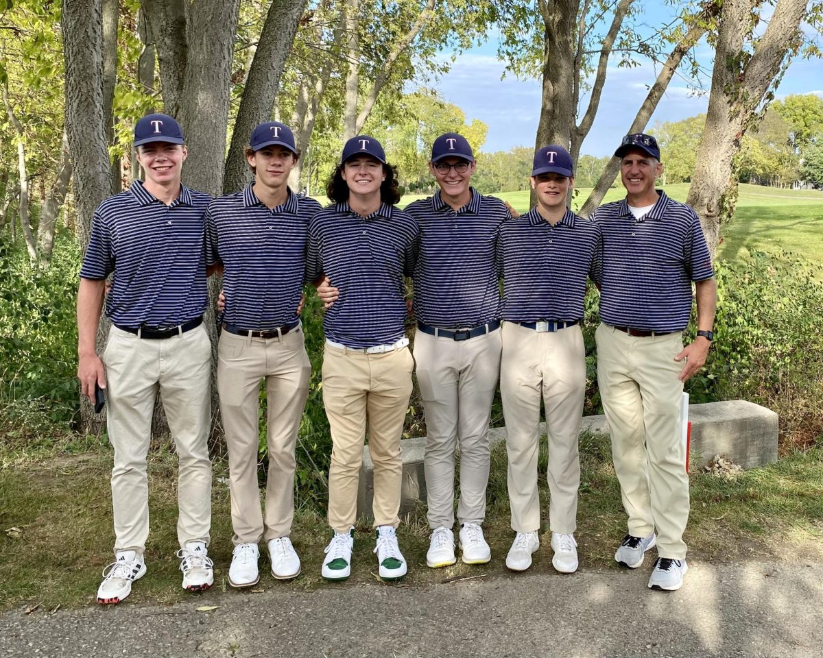 Micah Daniels, Aidan Bruder, Connor Schulte,Ty Huber, Brady Schutte and Don Gloeckner stand as a team one last time at the district tournament.
